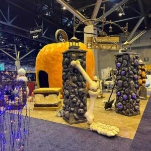 sprayable plastic coating for themed environment