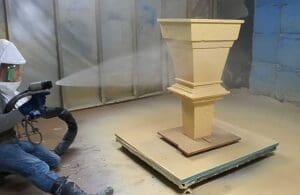 High-pressure spraying a carved EPS structure with hard coat